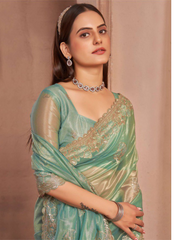 Nakshatra Green Shimmery saree
