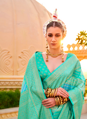 Nakshatra Teal Green Printed Saree