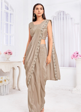 Nakshatra Beige color Sari with Jacket