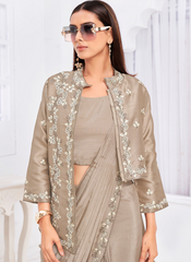 Nakshatra Beige color Sari with Jacket