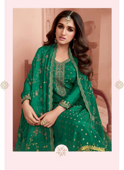Nakshatra Green Dola Jaquard Embroidered Suit