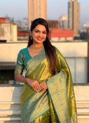 Nakshatra Green Weaved Tissue Silk Saree