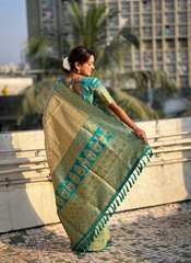 Nakshatra Pista Weaved Tissue Silk Saree