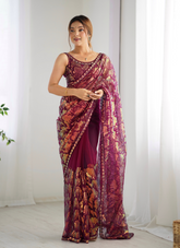 Nakshatra Wine Embellished Net Saree