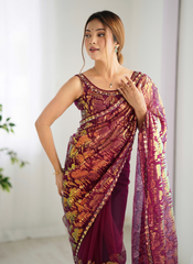 Nakshatra Wine Embellished Net Saree