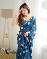 Nakshatra Teal Blue sequinned saree