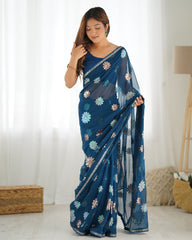 Nakshatra Teal Blue sequinned saree