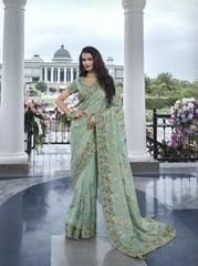 Nakshatra Green Wedding Wear Saree