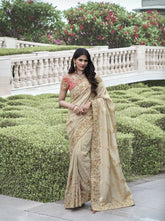 Nakshatra Beige Wedding Wear Saree
