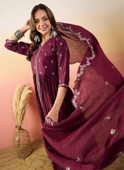 Nakshatra Maroon Colored Silk Embroided suit