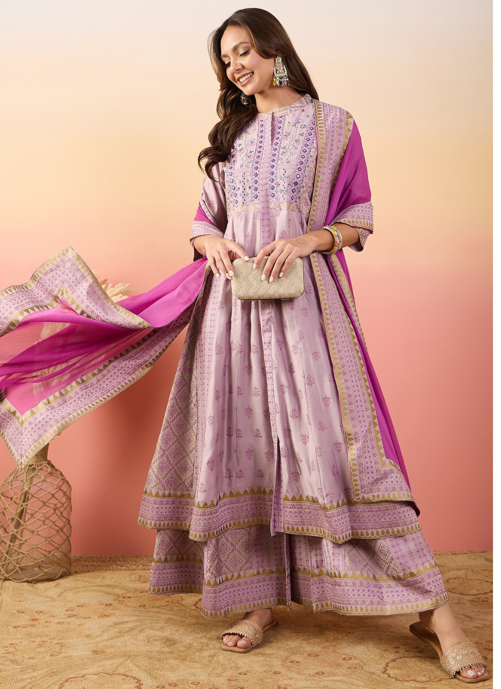 Nakshatra Pink Colored Silk Embroided suit