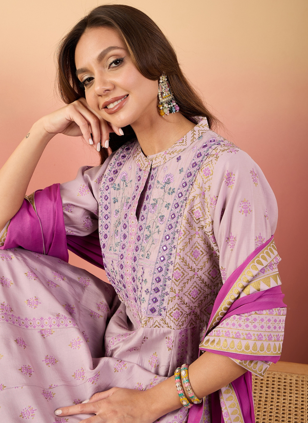 Nakshatra Pink Colored Silk Embroided suit