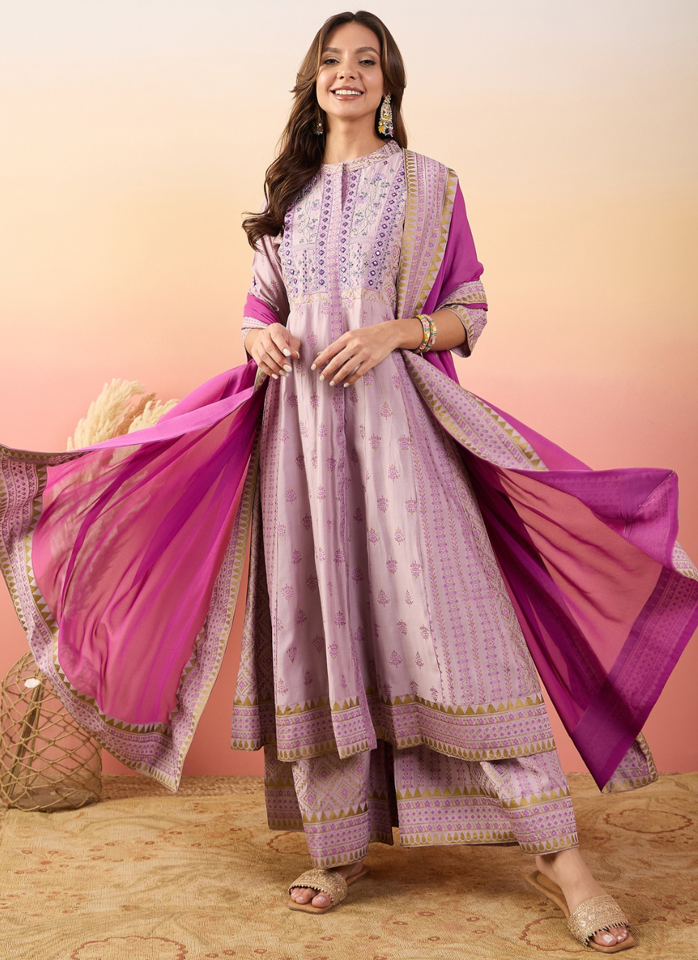 Nakshatra Pink Colored Silk Embroided suit