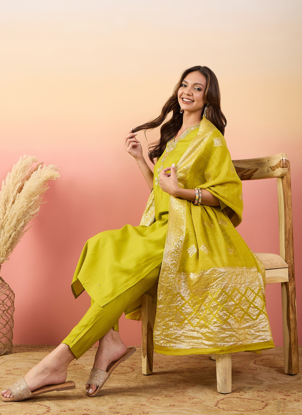 Nakshatra Yellow Colored Silk Embroided suit