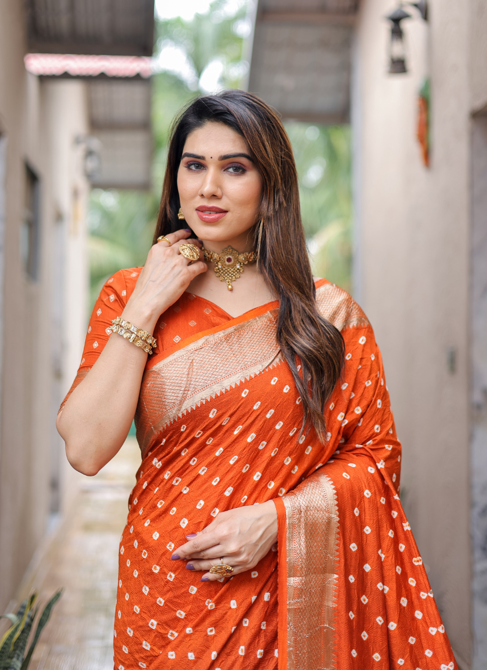 Nakshatra Orange Bandini Saree in Dola Silk