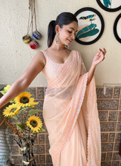 Nakshatra Peach Sequenced Cut Work Saree