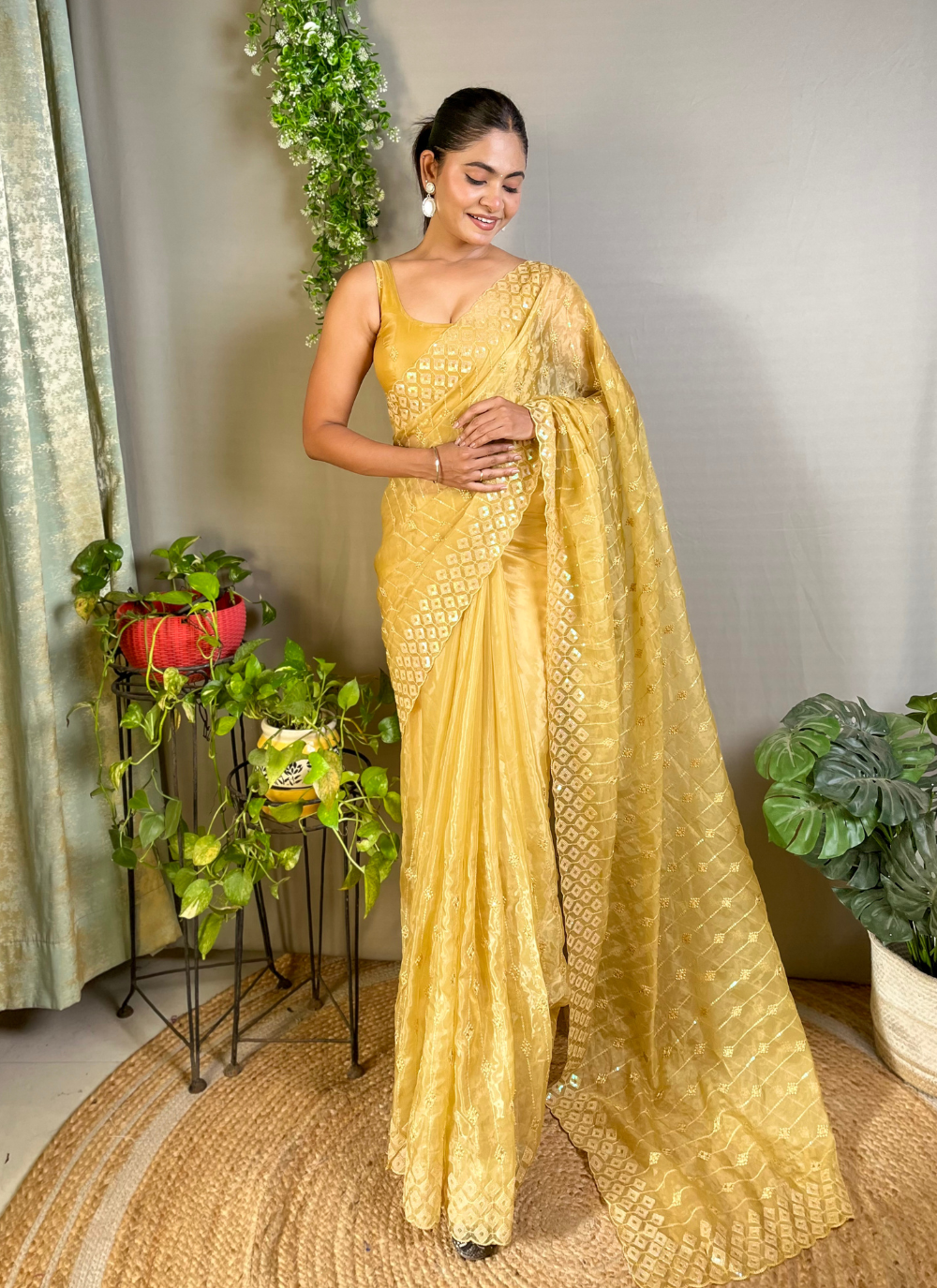 Nakshatra Yellow Embellished Sequence Saree