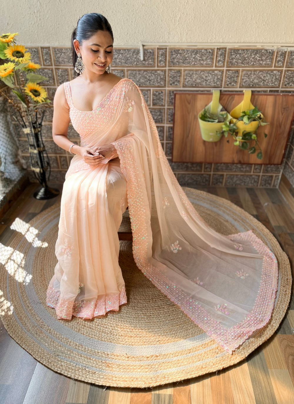 Nakshatra Peach Sequenced Cut Work Saree