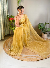 Nakshatra Yellow Embellished Sequence Saree