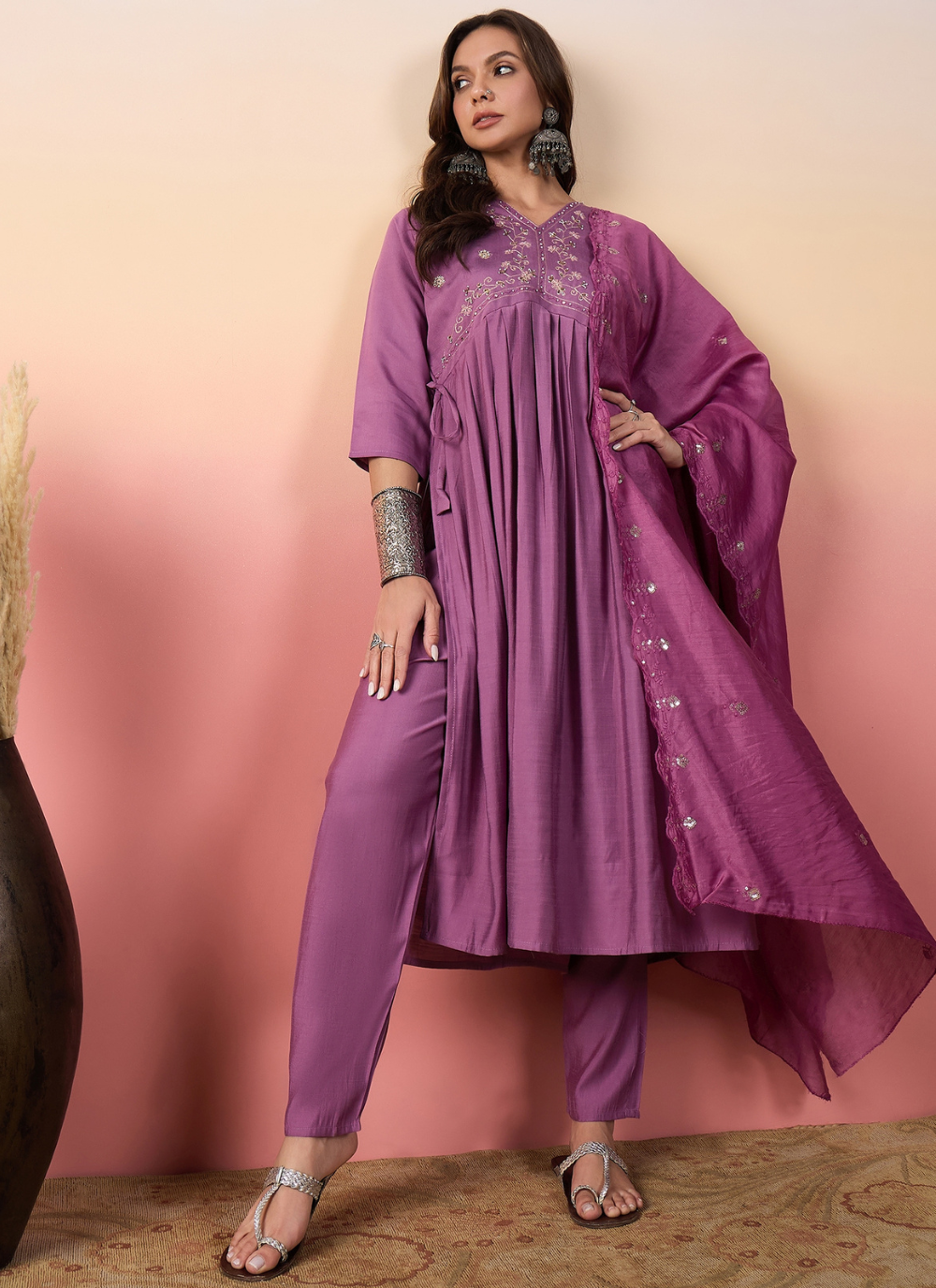 Nakshatra Purple Colored Silk Embroided suit