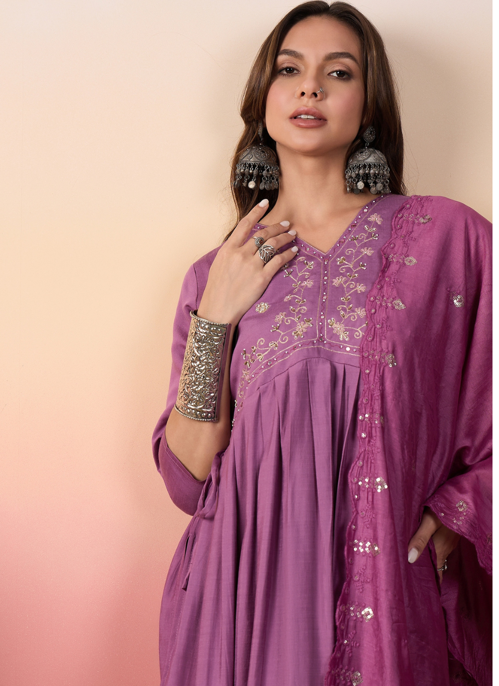 Nakshatra Purple Colored Silk Embroided suit