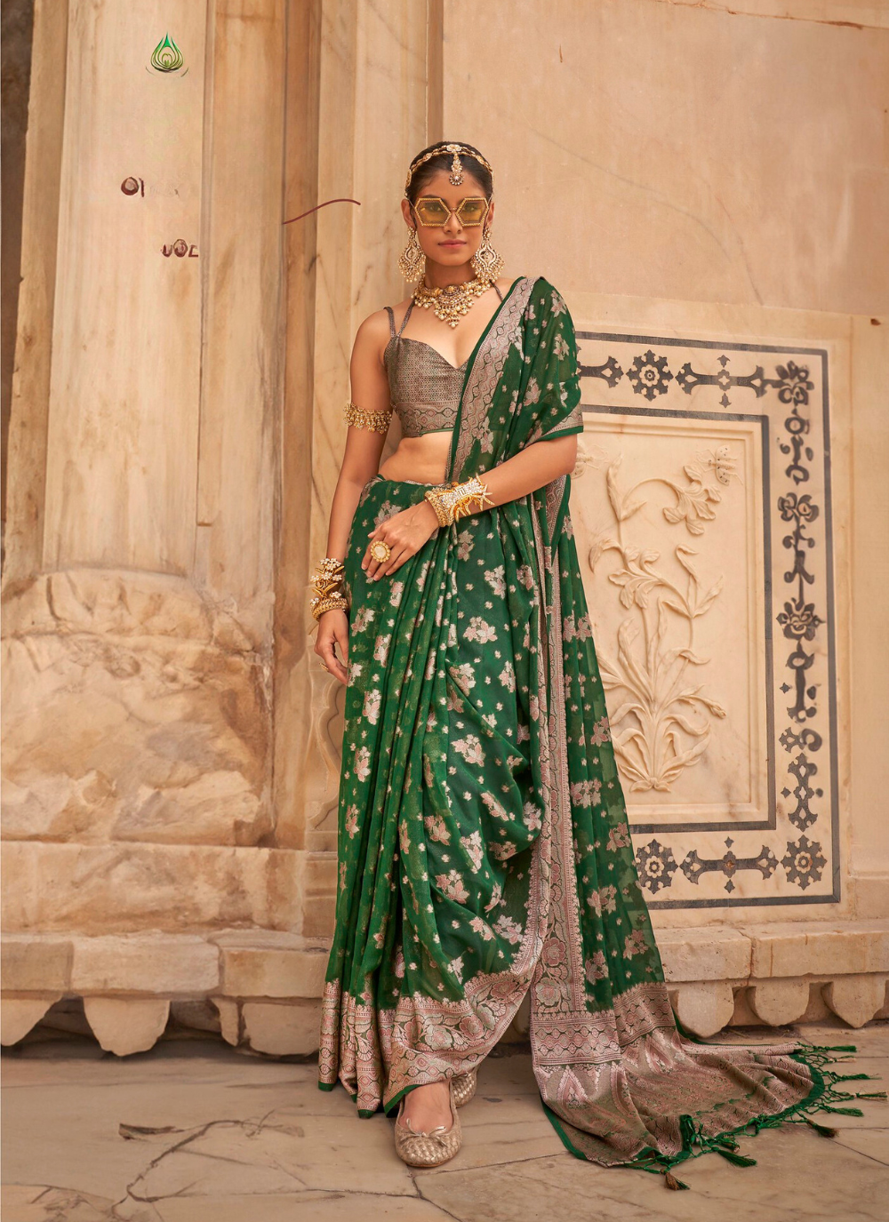 Nakshatra Bottle Green Zari Woven Georgette Saree