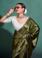 Nakshatra  Diamond studded Olive Green saree.