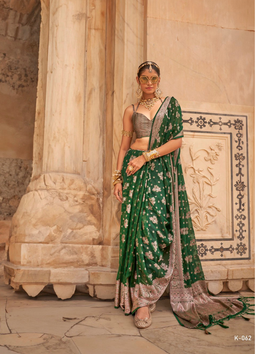 Nakshatra Bottle Green Zari Woven Georgette Saree