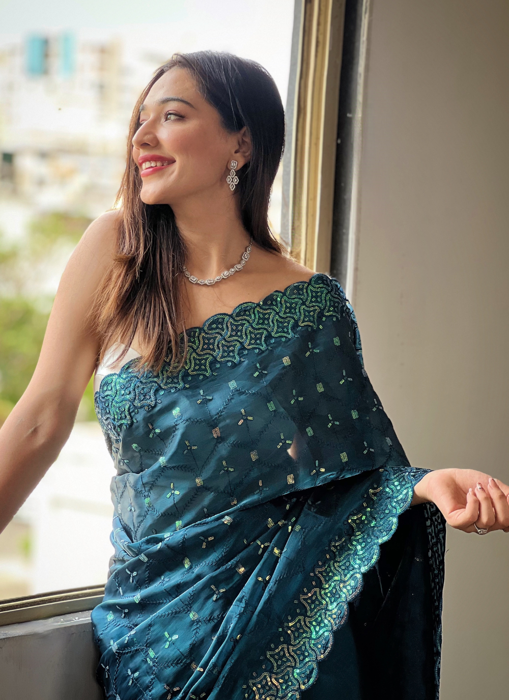 Nakshatra Teal Trendy Sequin Saree