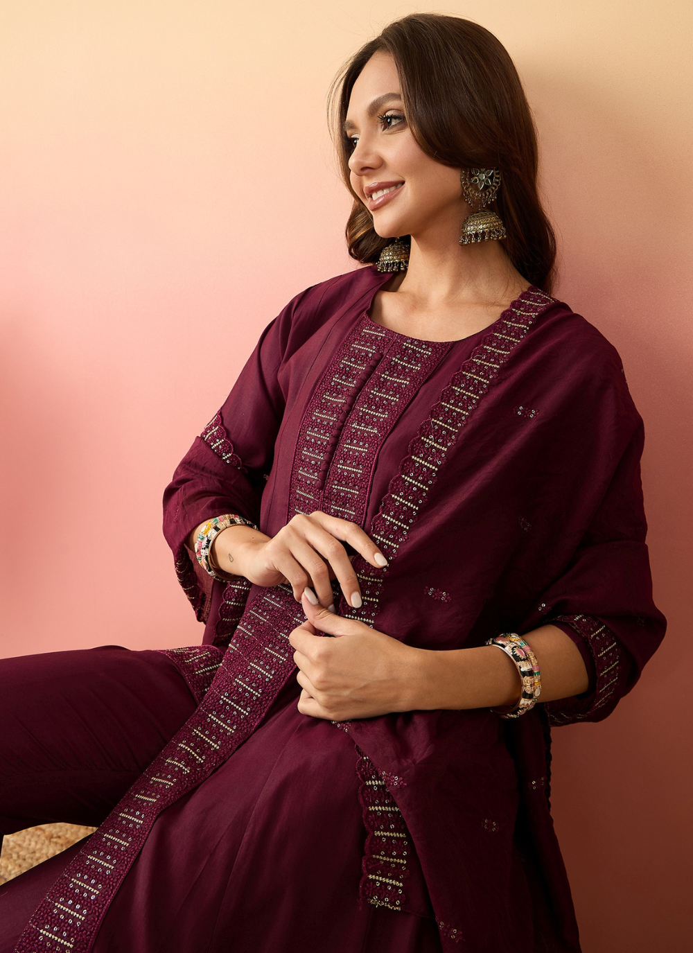 Nakshatra Wine Colored Silk Embroided suit