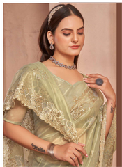 Nakshatra  Pista Green Shimmery saree