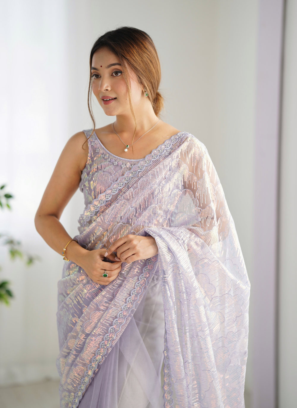 Nakshatra Lavender Embellished Net Saree