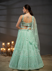 Nakshatra Turquoise Net Lehenga