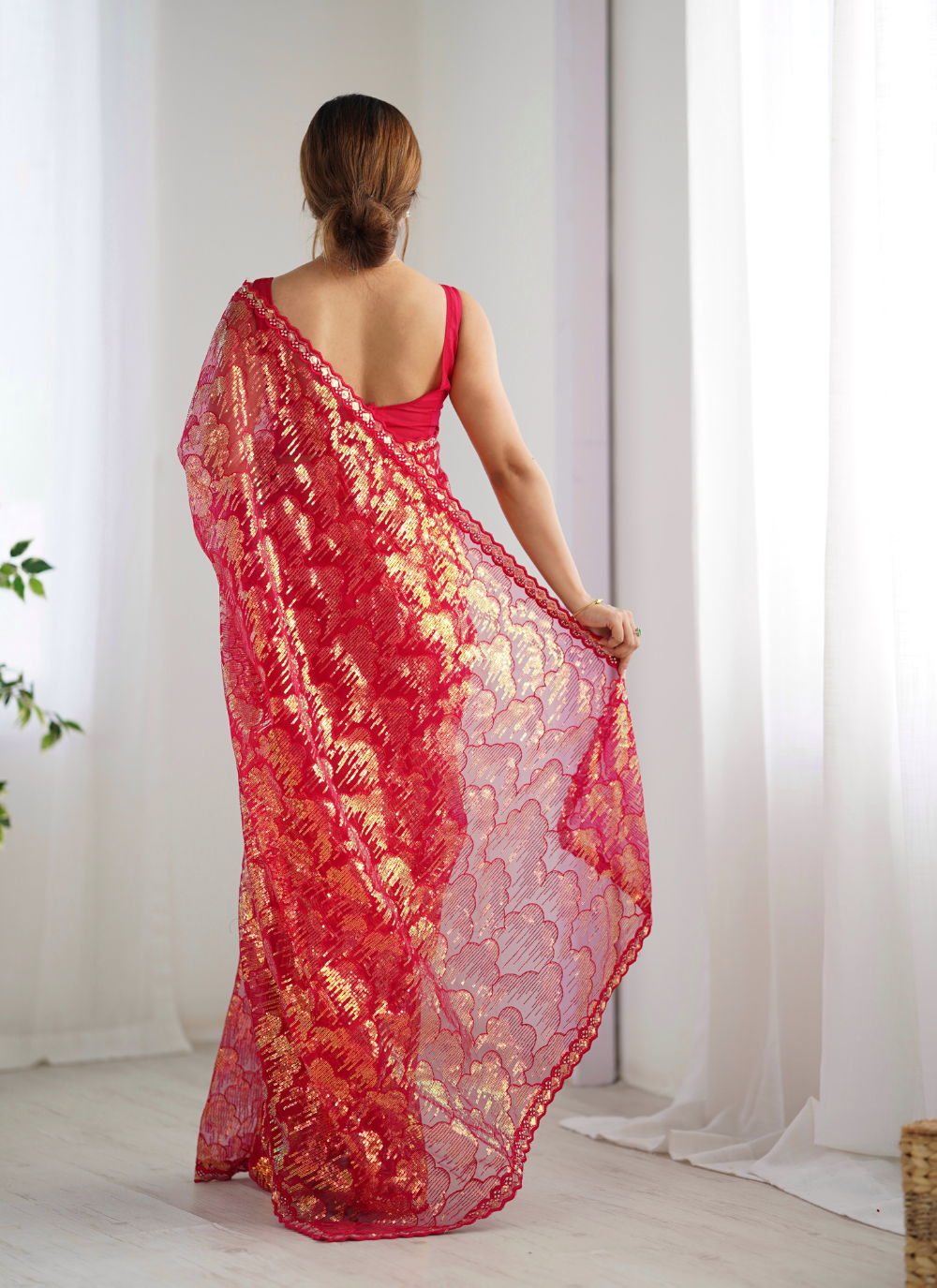 Nakshatra Pink Embellished Net Saree