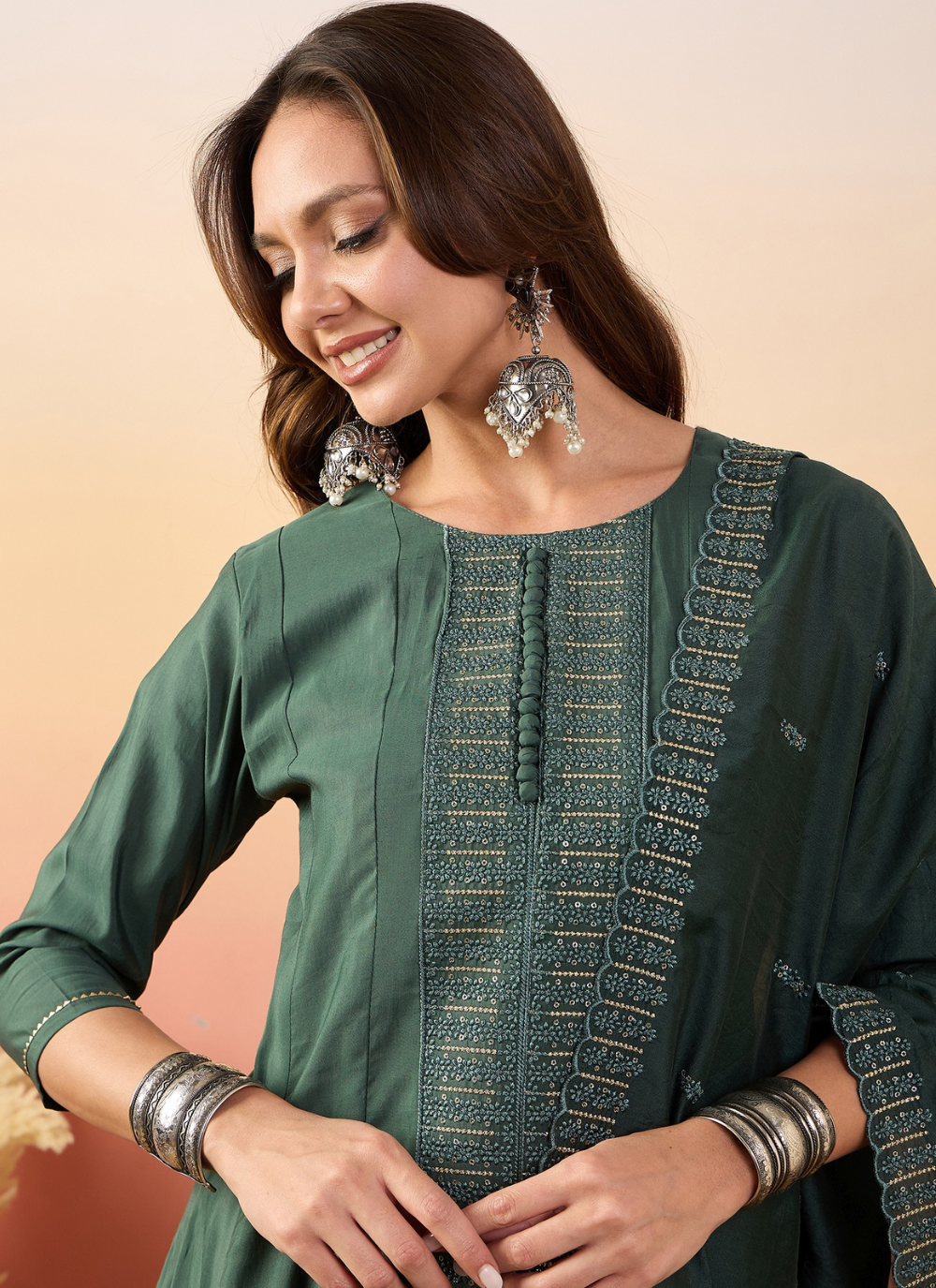 Nakshatra Olive Green Colored Silk Embroided suit