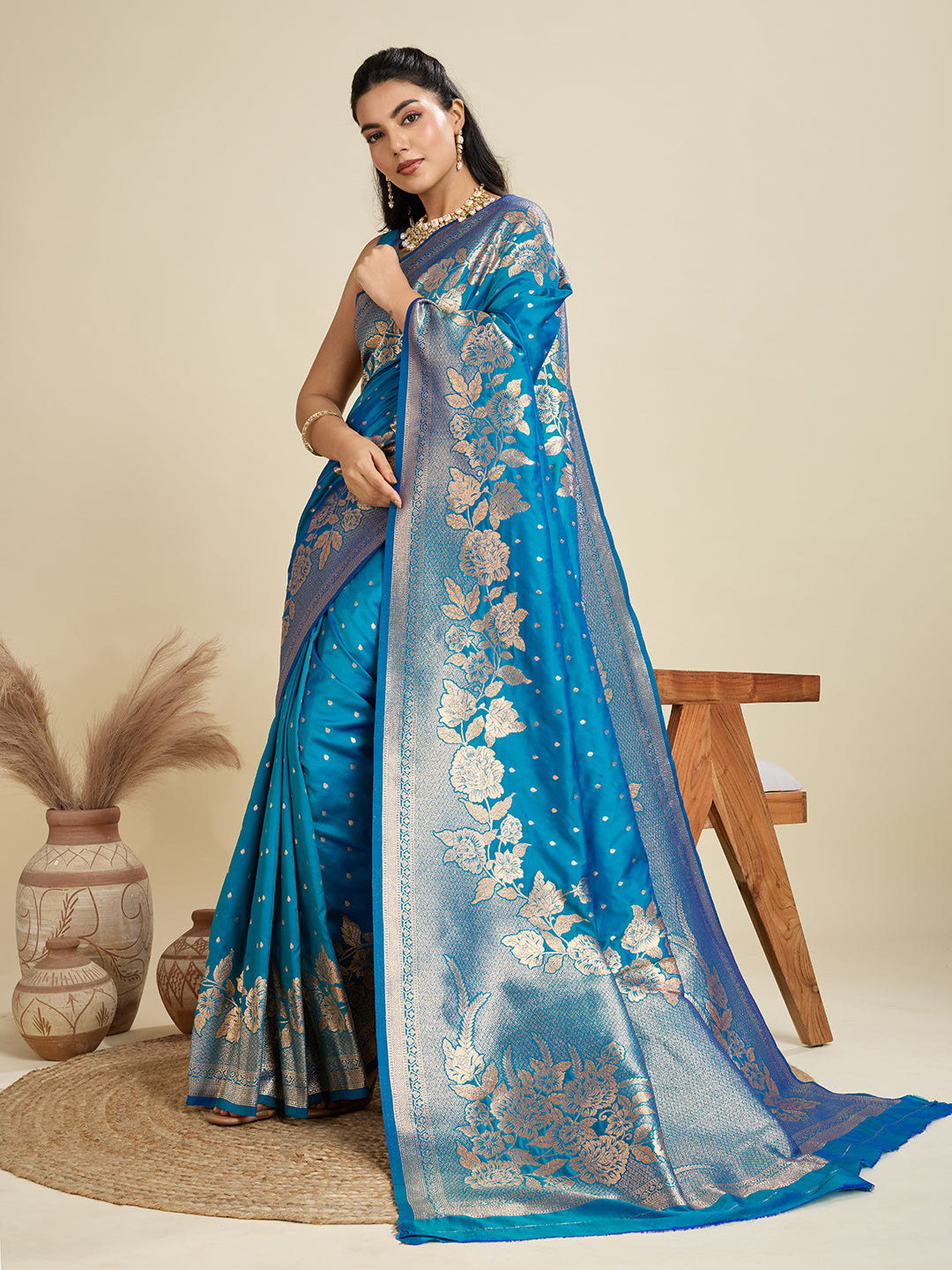 Nakshatra Teal Blue Kanjivaram Silk Saree with Intricate Zari Motifs