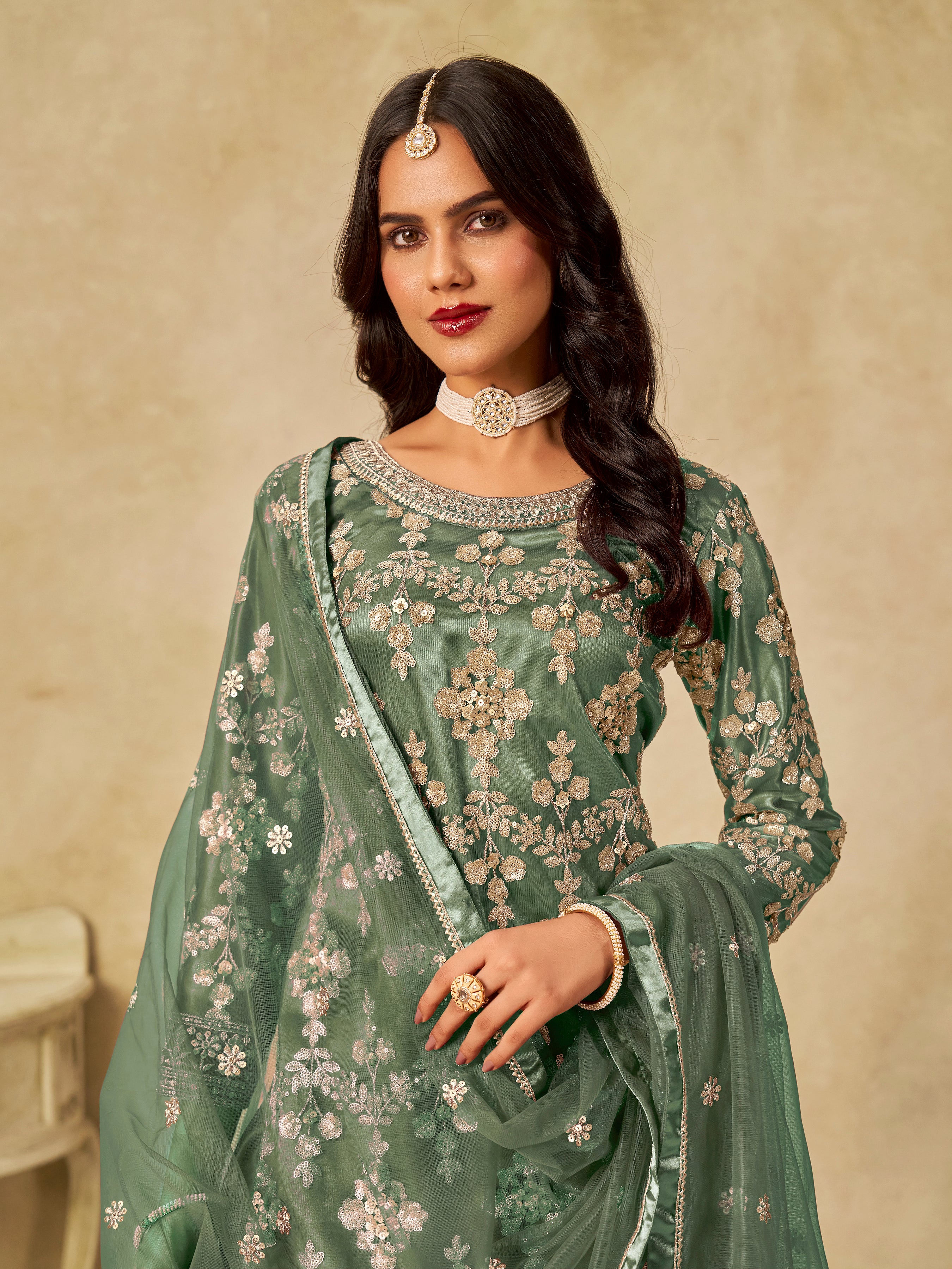 Nakshatra Pista Green Designer Suit with Heavy Net Embroidery