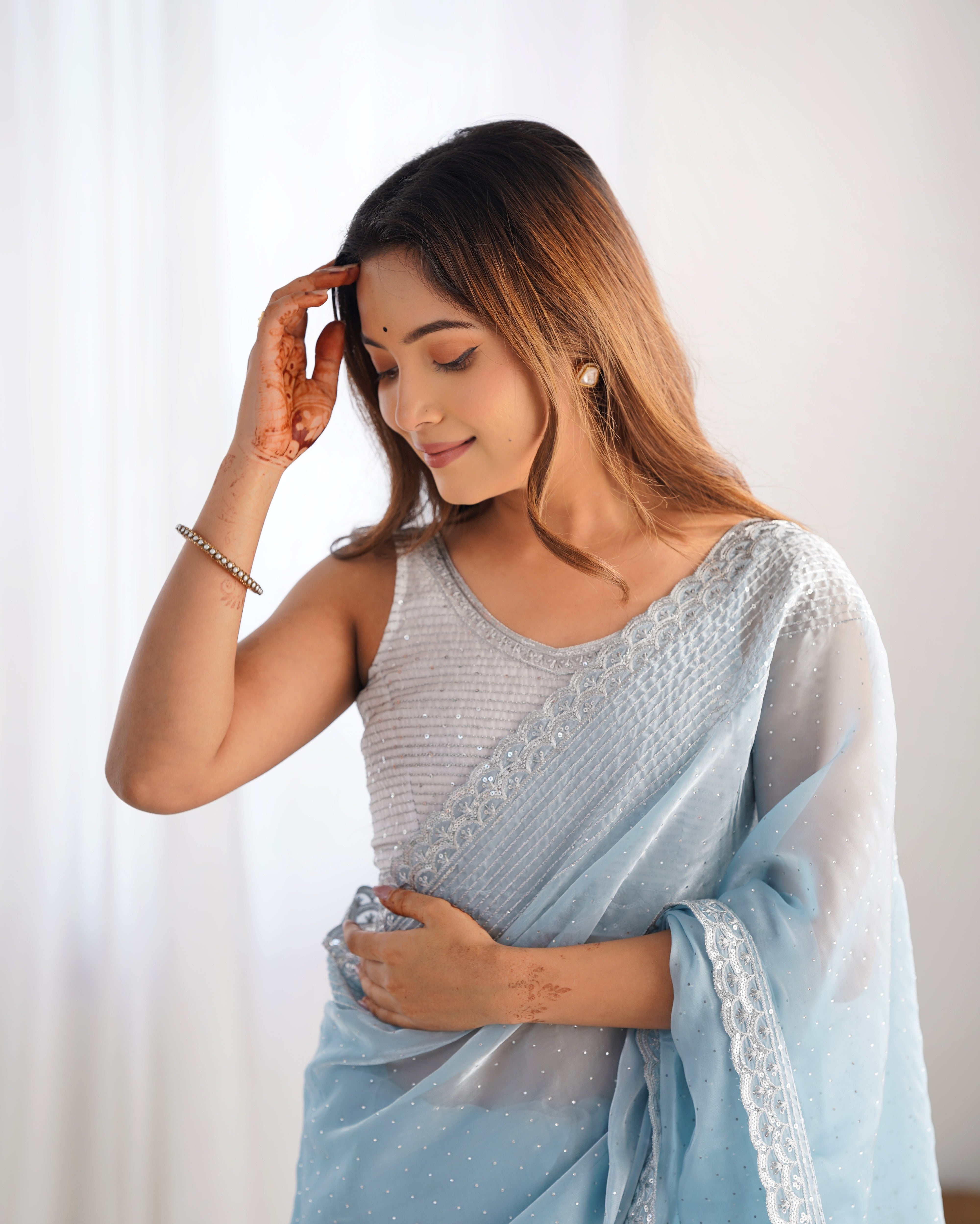 Nakshtara Sky Blue Embellished Saree