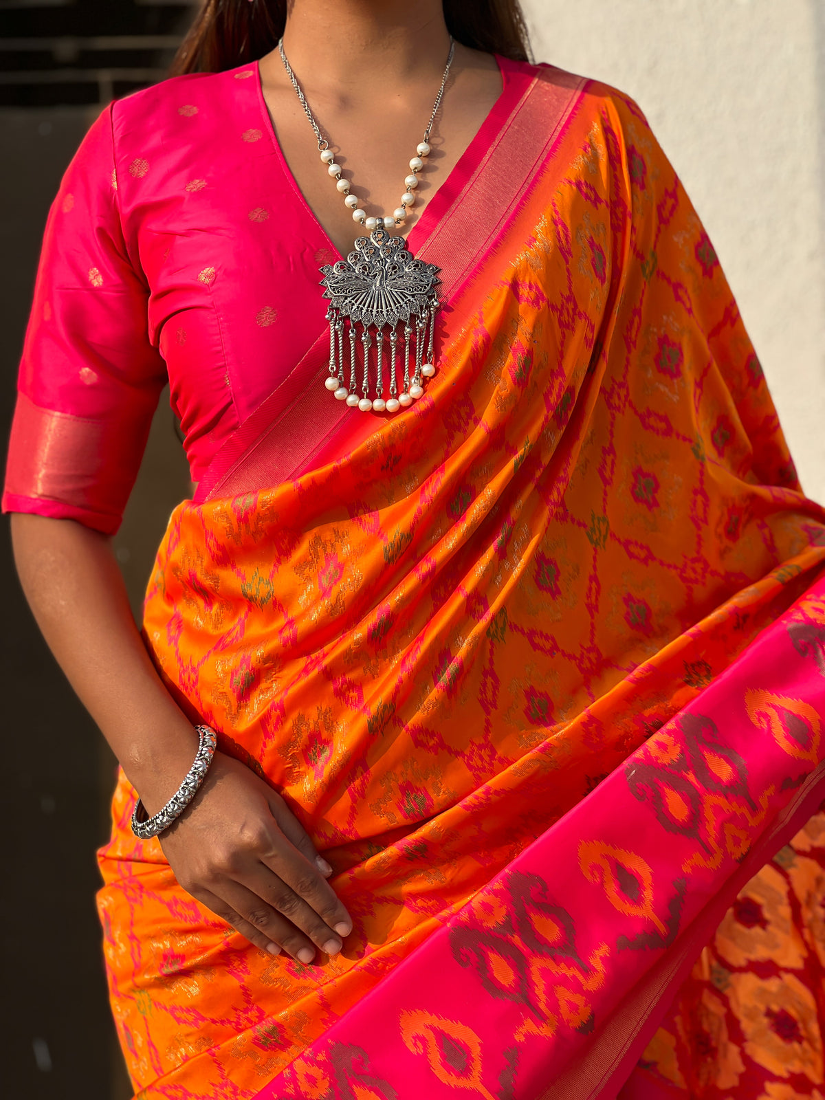 Nakshatra Orange Ikkat  Patola Silk Saree