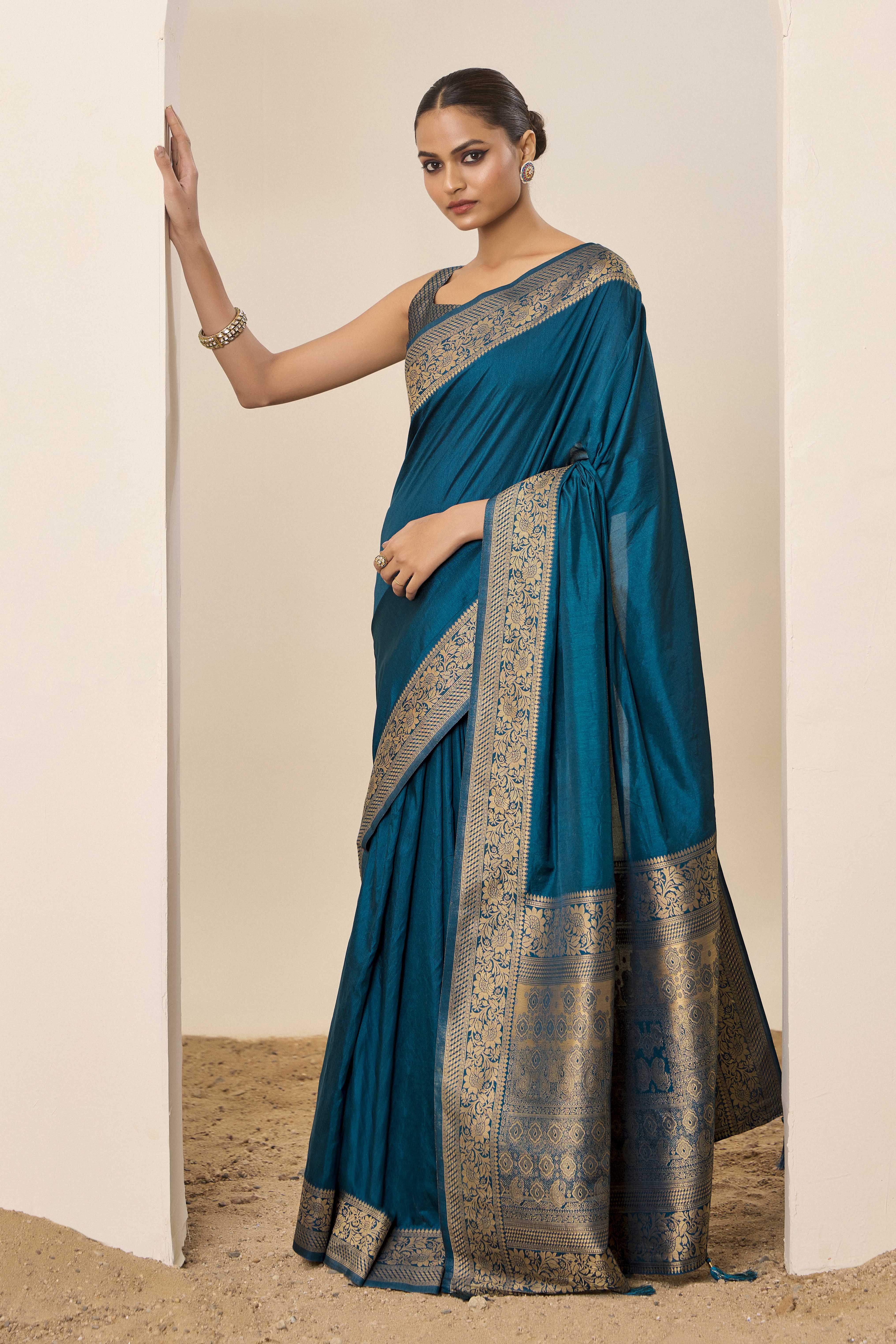 Nakshatra Teal Blue Dola Silk Saree