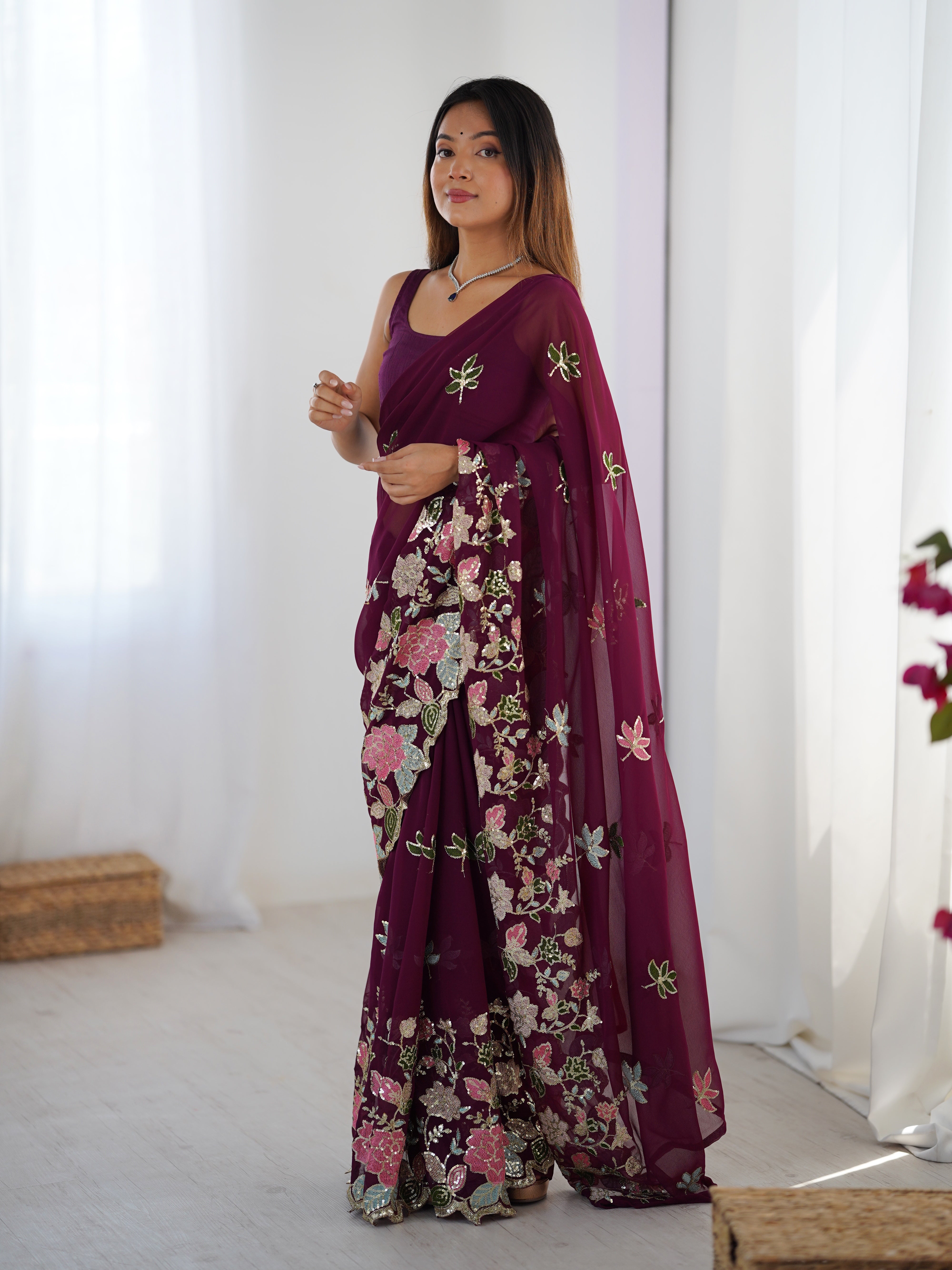 Nakshatra Wine Embroidered Georgette Saree